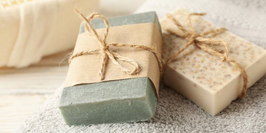 Handmade AuraBliss soaps displayed together