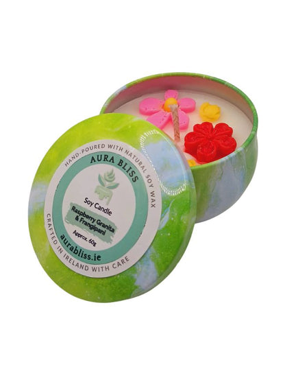 Raspberry Granita and Frangipani soy candle in decorative tin with flower-shaped wax decoration