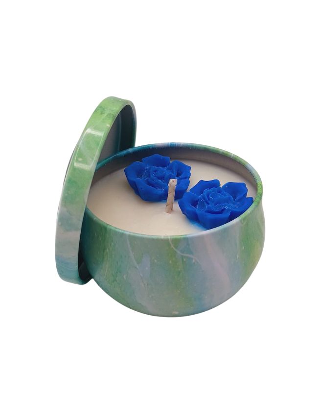 Soy candle in green decorative tin with blue rose wax decoration