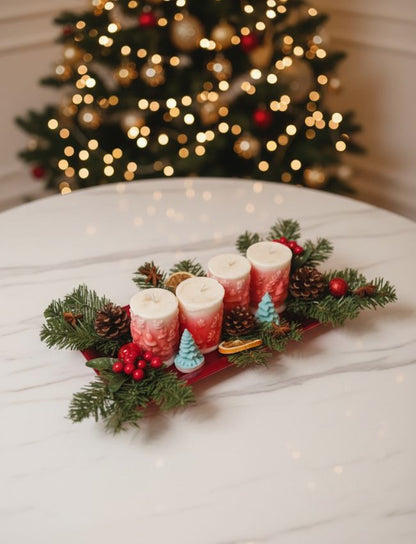 Festive candle centrepiece with greenery, berries and dried orange