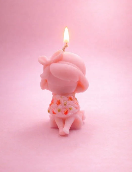 Pink Whimsical Girl soy wax figurine candle holding flowers
