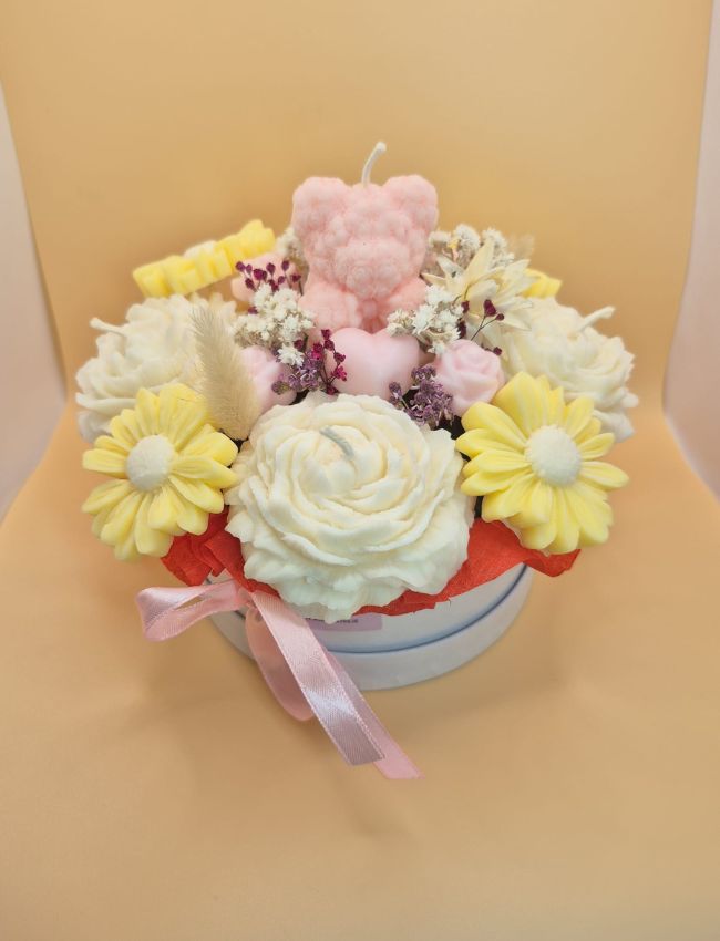 Pastel yellow and white soy wax candle bouquet for decorative gifting.