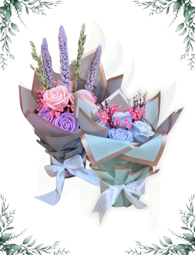 Bouquet of flower-shaped soy wax candles in white wrap.