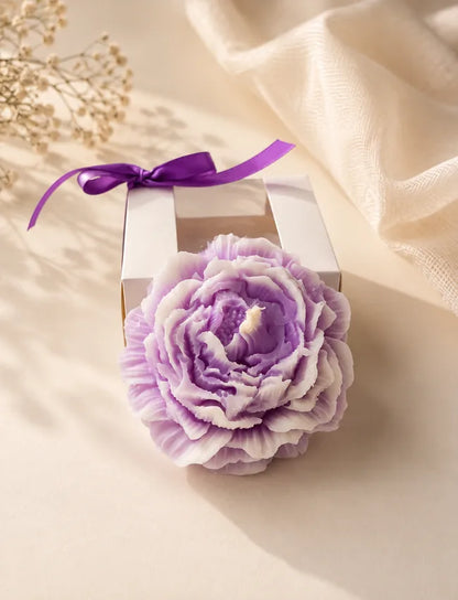 Lavender flower-shaped soy wax candle presented in a white ribbon gift box by AuraBliss