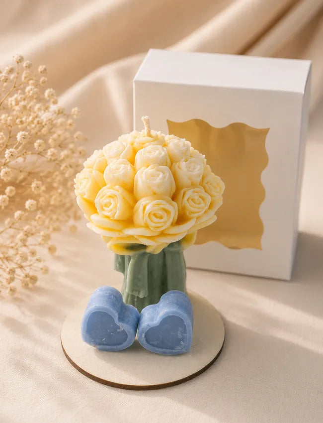 AuraBliss ivory rose bouquet candle with blue heart details, handmade in Ireland
