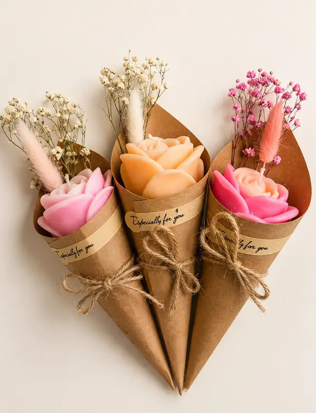 Assorted AuraBliss single rose wax bouquets in pink and peach with dried florals