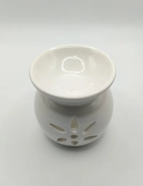 Front view of a white ceramic wax burner with a smooth finish.
