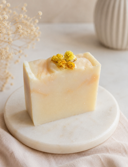 Eternal Mimosa handmade soap on round stone tray