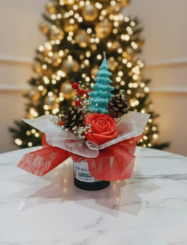 Mini festive candle bouquet with pinecones
