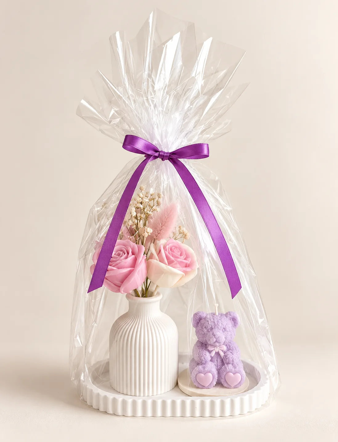 Handcrafted Rose & Teddy Luxury Gift Set wrapped in clear presentation film with purple ribbon