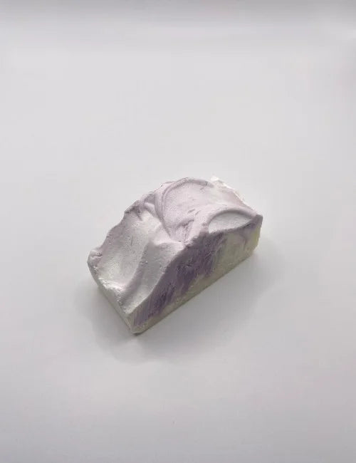 A lavender and lemon soap bar with a smooth finish, offering a calming and refreshing natural cleansing experience.