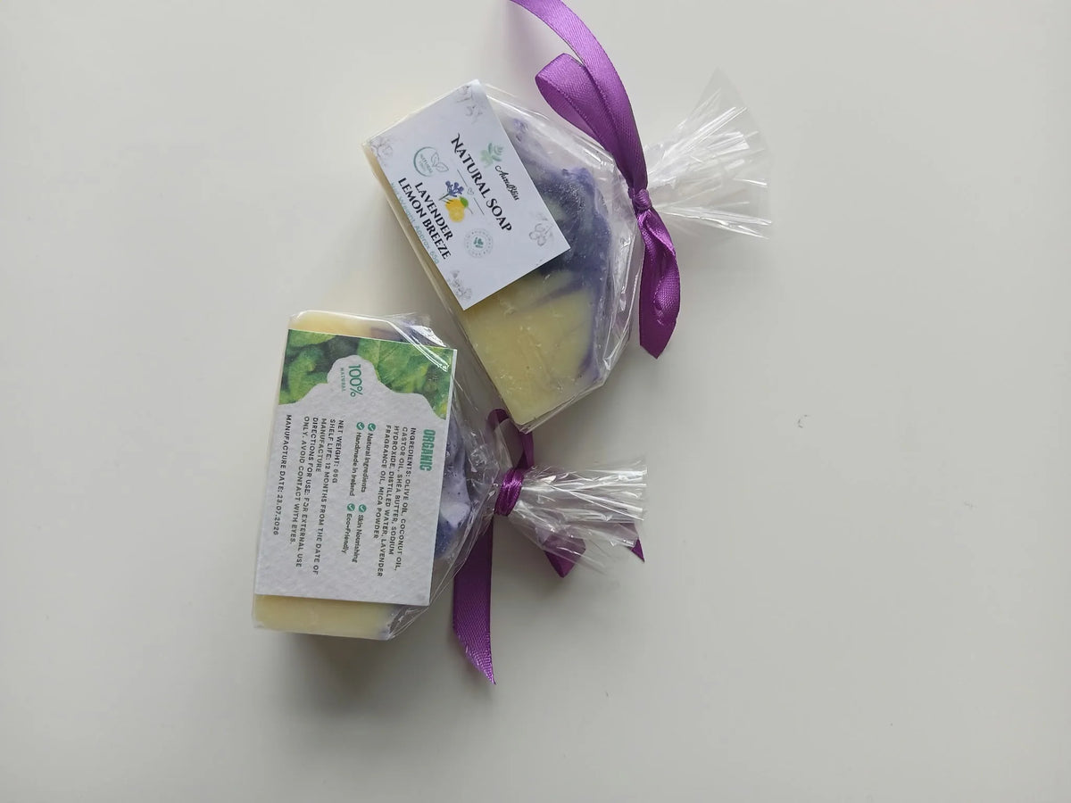 Two wrapped soap bars showing a front product label and an ingredients label