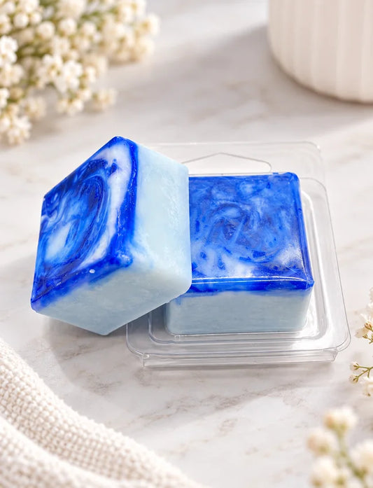 Single Soy Wax Melt in mini clamshell, blue marbled finish, styled lifestyle image