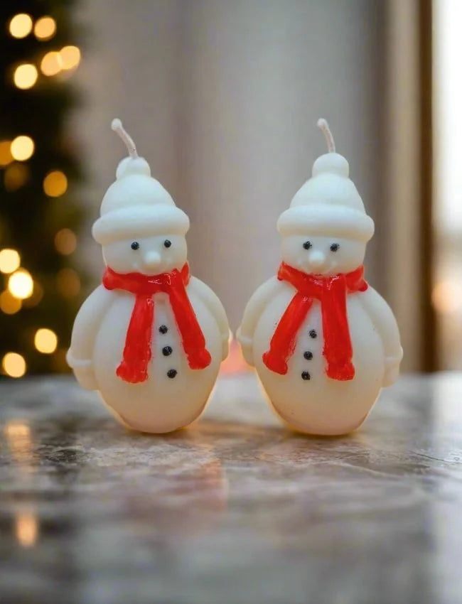 Snowman soy candles with festive red scarves