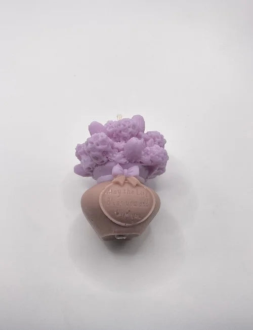 Lavender Spring Blossom soy candle with intricate flower patterns, creating a calming and elegant atmosphere.