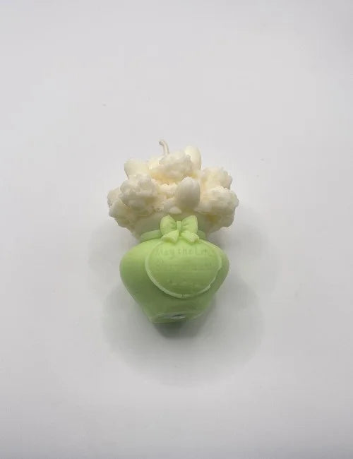 White Spring Blossom soy candle featuring intricate floral accents, adding a natural and refreshing touch to decor.