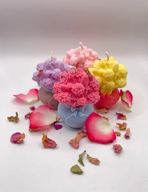 A group of Spring Blossom soy candles in assorted vibrant colors with intricate floral designs, ideal for home decor and gifting.
