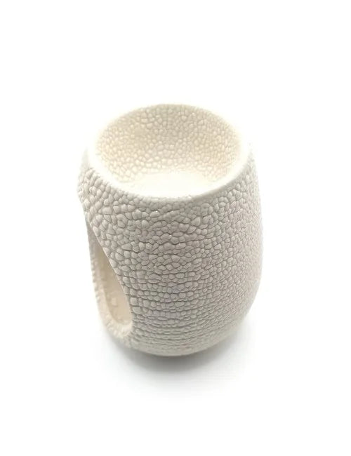 Side view of the Stone Haven Wax Burner showing the tealight opening.