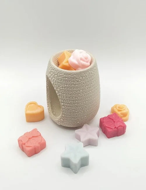 Stone Haven Wax Burner filled with colorful wax melts.