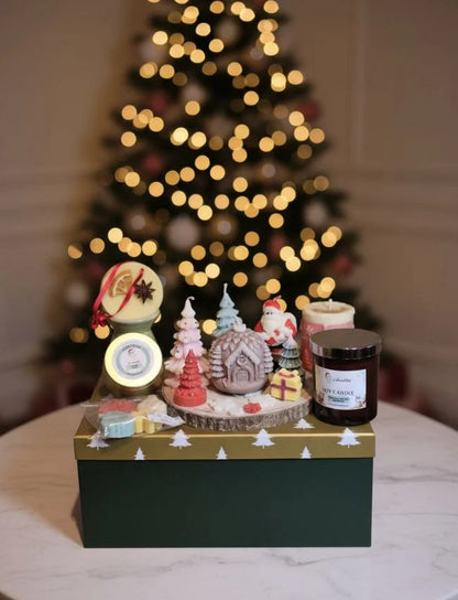Ultimate Christmas Candle and Diffuser Gift Set in green boxes