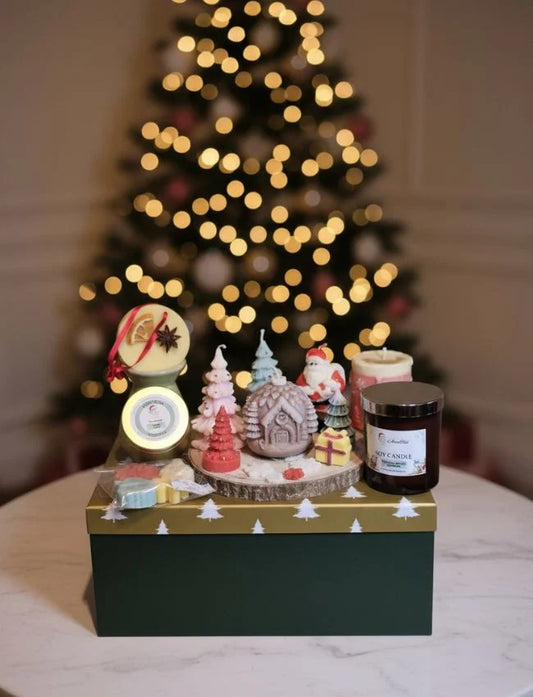 Ultimate Christmas Candle and Diffuser Gift Set in green boxes