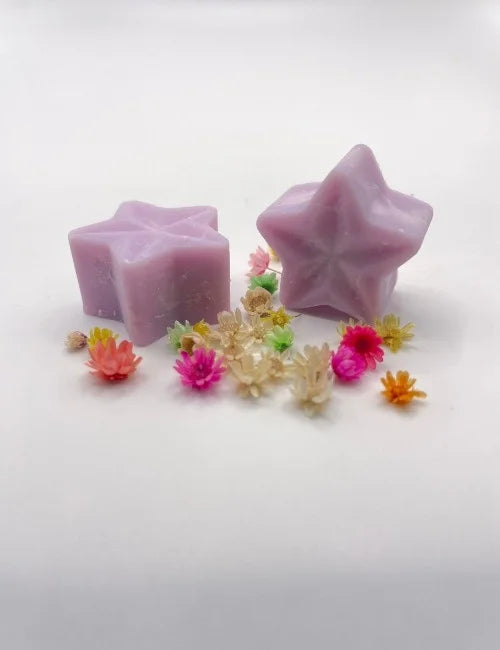 Lavender-coloured star-shaped soy wax melts